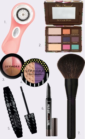  1. Clarisonic Mia 2 Skin Cleansing Brush Sunwashed Peach 2.  Too Faced, Sugar Pop Eyeshadow Palette 3. SEPHORA Collection MicroSmooth Baked Sculpting Contour Trio 4. SEPHORA Craig & Karl Colorful Duo Eyeshadows 5. SEPHORA Collection Outrageous Volume Mascara Ultra Black 6. Benefit they're real! push – up liner 7. SEPHORA PRO. Πινέλο Large Poudre Teint 30 