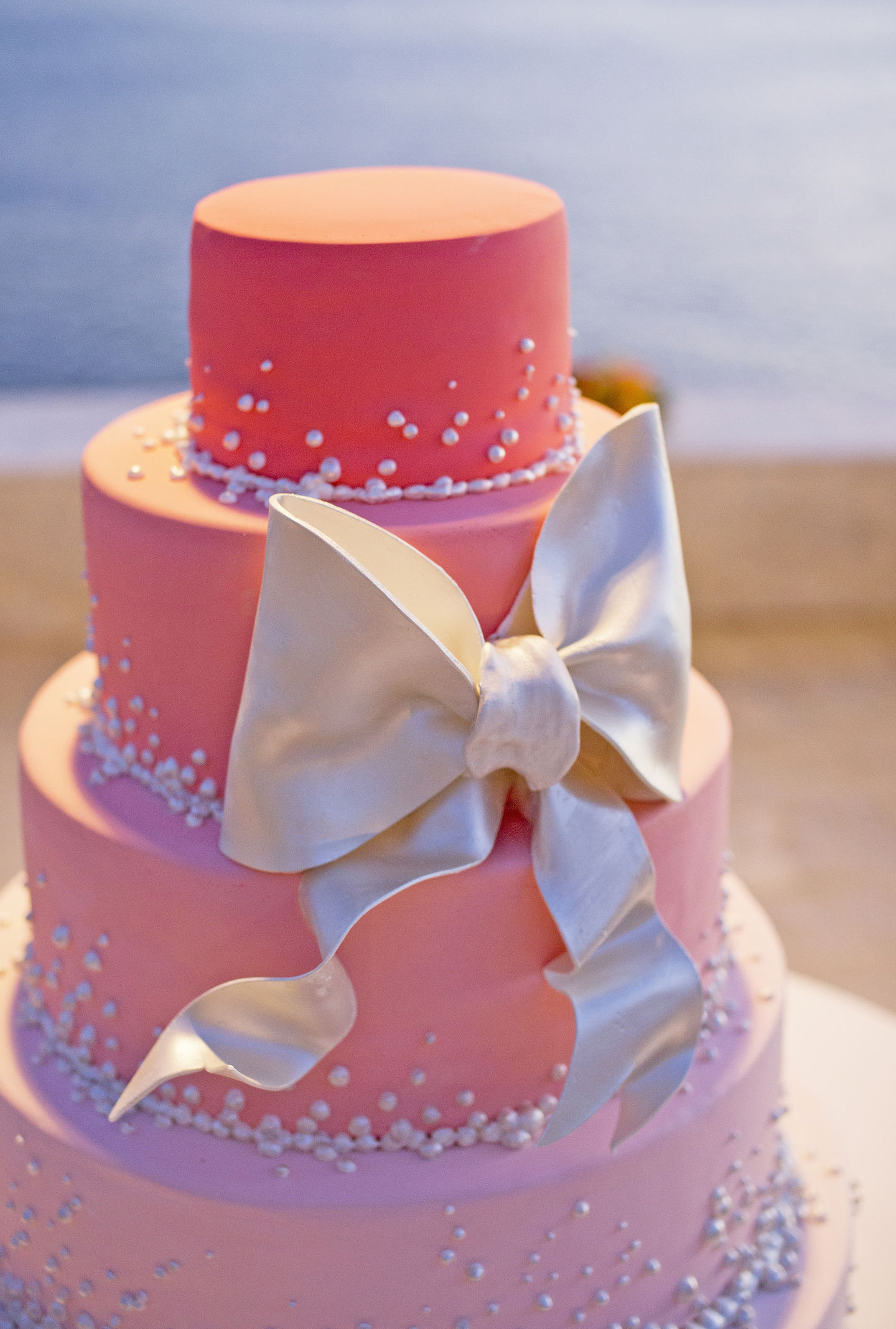 4 TIERED CORAL OMBRE WEDDING CAKE WITH PEARL BOW - Copy