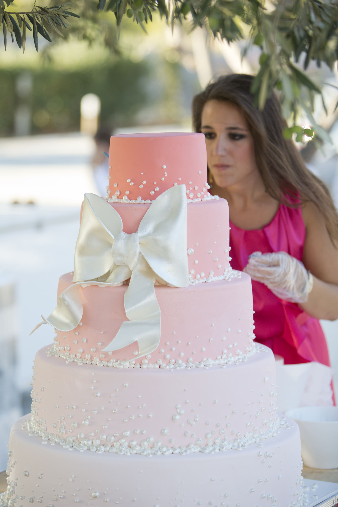ZOE PUTTING THE LAST TOUCHES ON WEDDING CAKE (1)