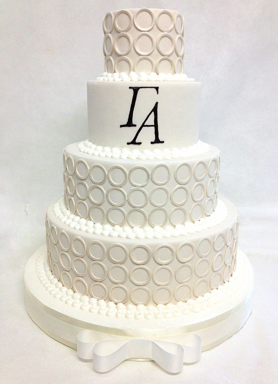 Photo 3 MODERN RINGS AND MONOGRAM WEDDING CAKE