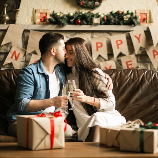 Couple on Christmas with champaign