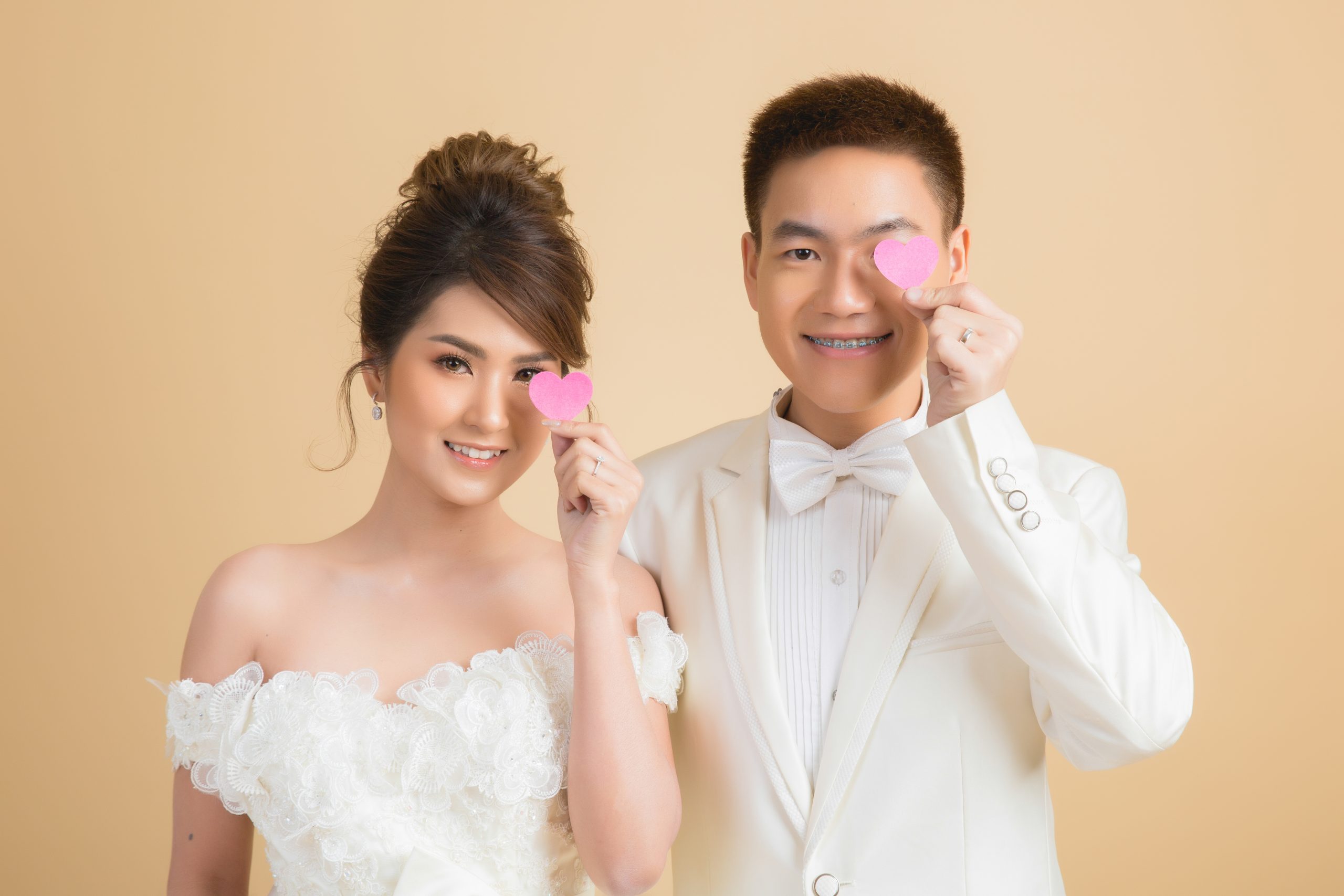 Beautiful happy couple in wedding in studio