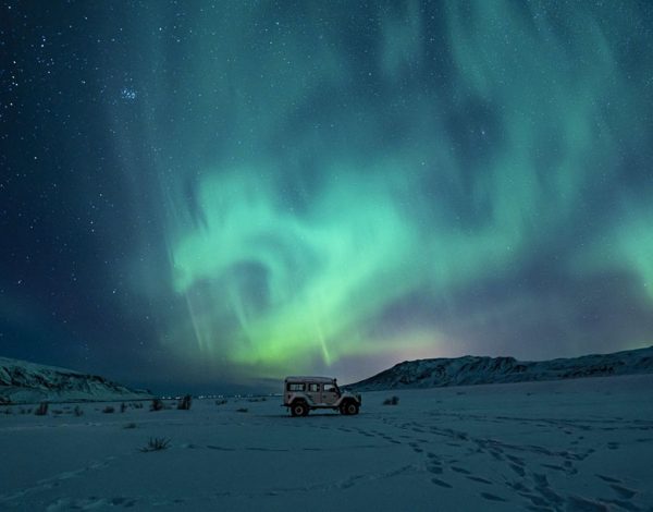 Κυνηγώντας το Βόρειο Σέλας: 4 ρομαντικοί προορισμοί (κοντά) στον Αρκτικό Κύκλο